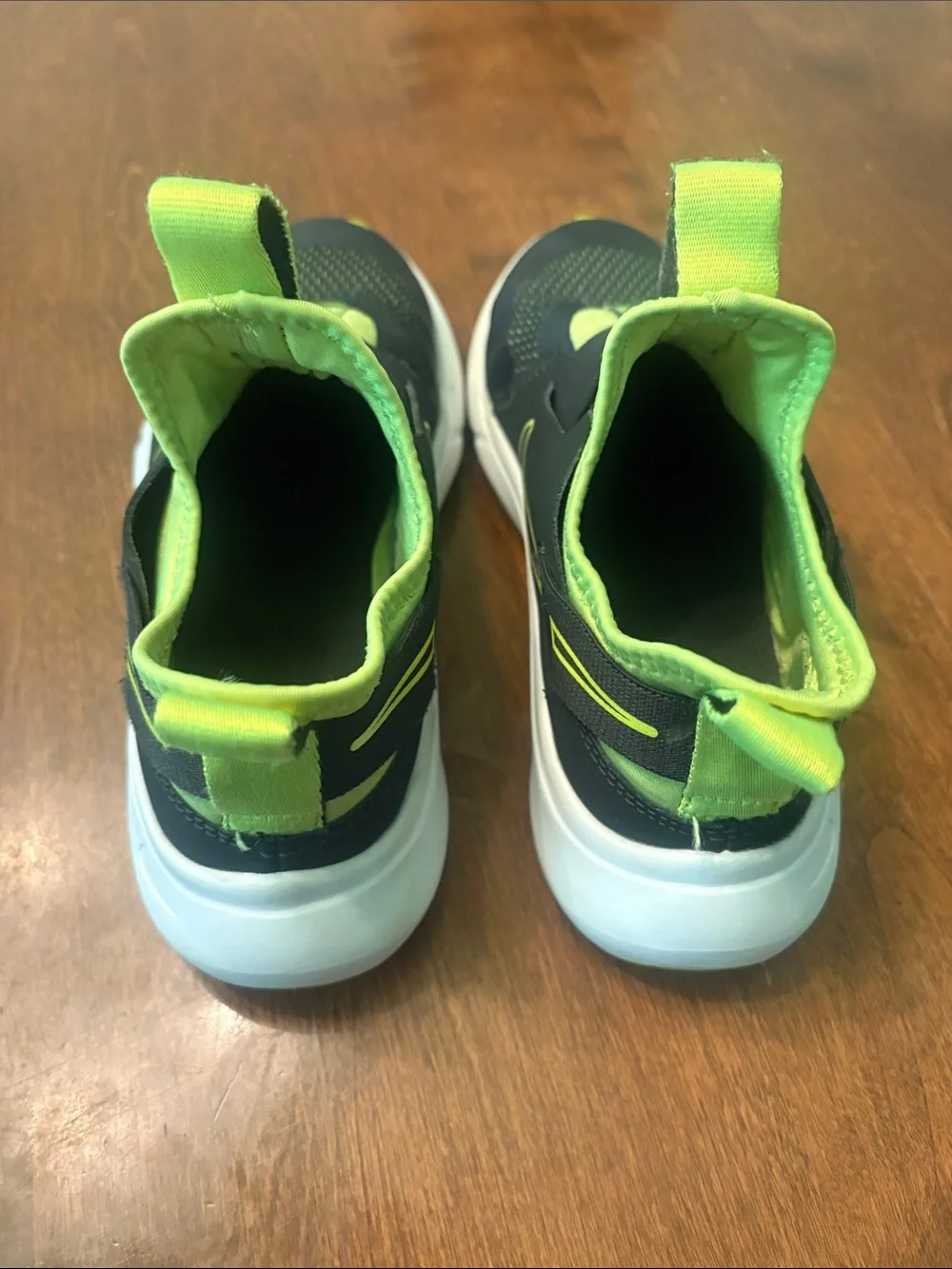 Nike Kids Slip-On Sneakers in Black and Neon Green